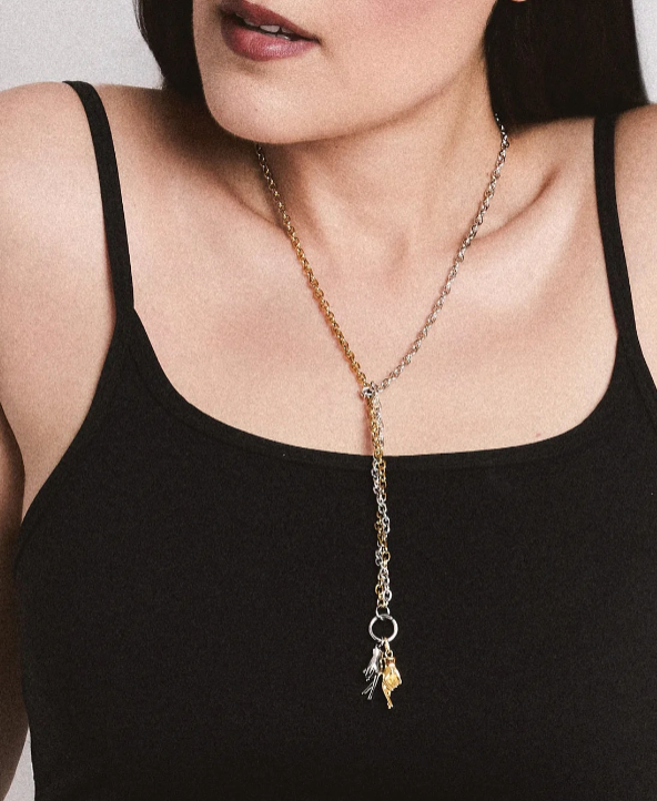 Fingers Crossed two-tone Y necklace worn with a black top – Cherry PaoPao