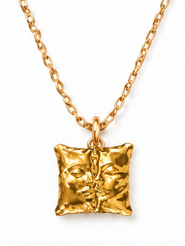 Love Pillow Gold Necklace – close-up of the pendant