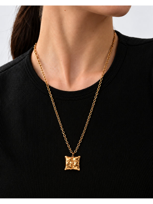 Love Pillow Gold Necklace – complete necklace worn by a model